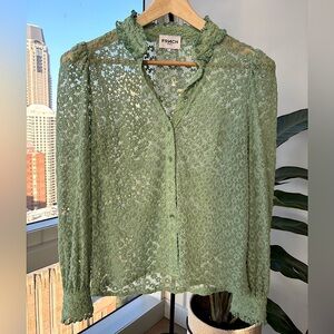 a chic mesh shirt with floral embroidery